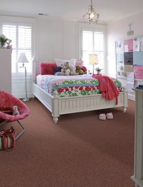 Bedroom with red carpet flooring